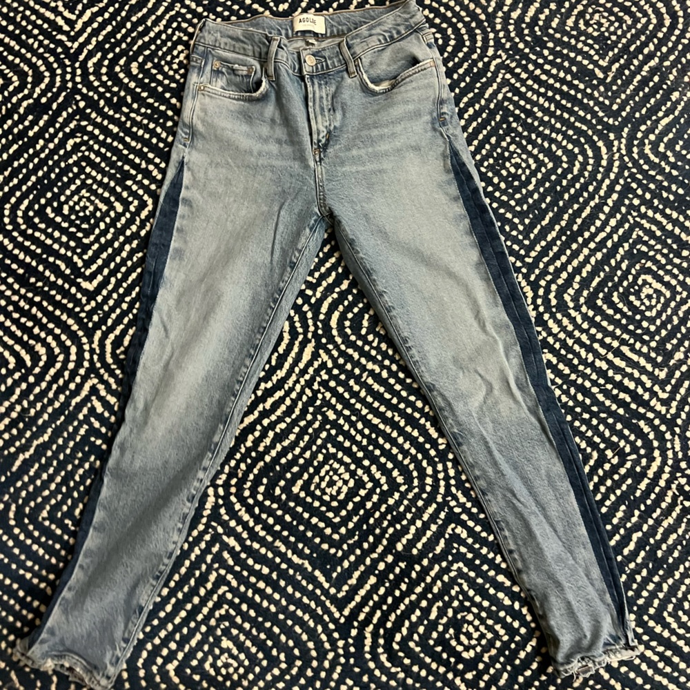 Jeans run small. Fit like a 26/27